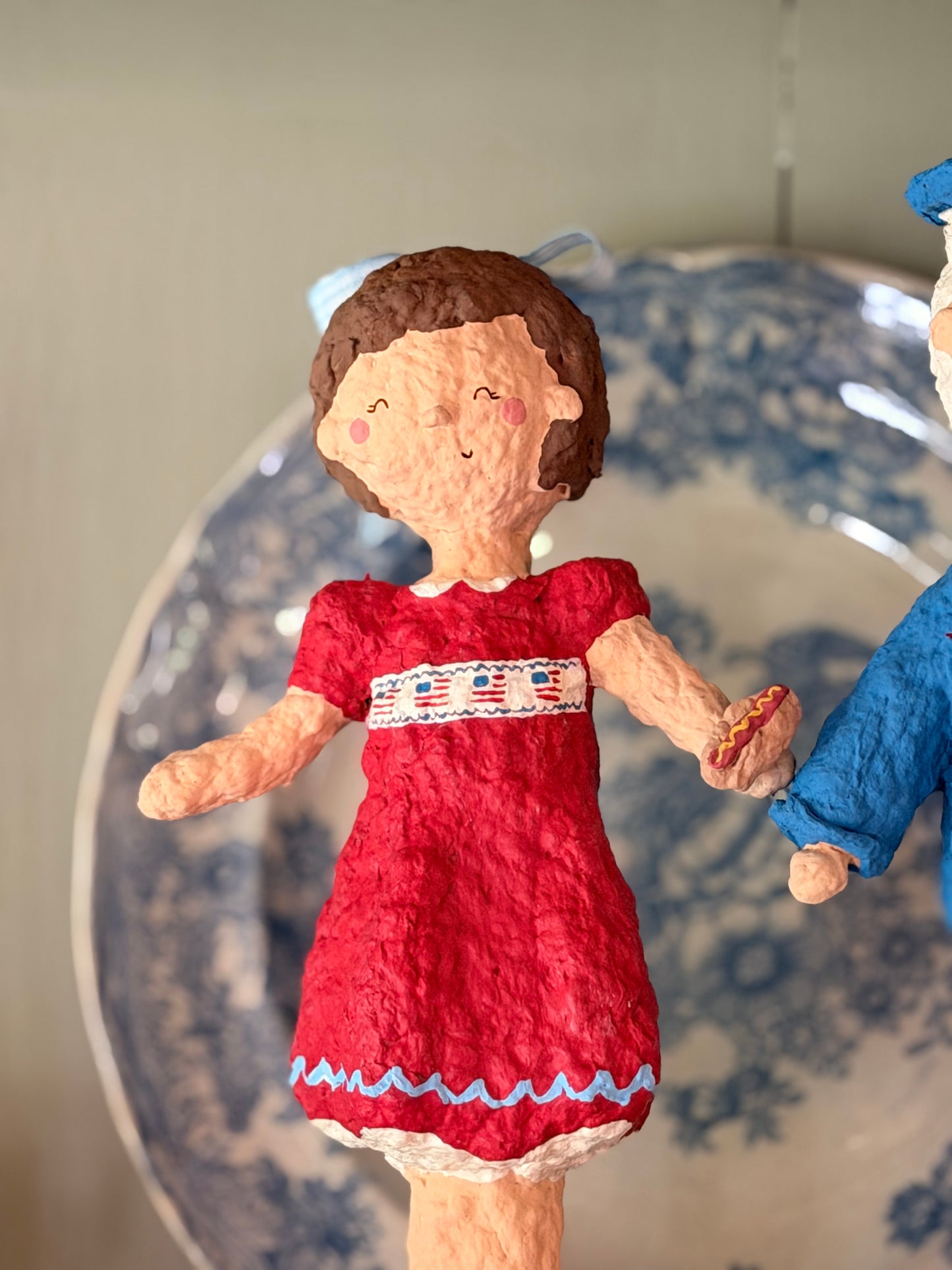 Maisie the Patriotic Girl paper mache figurine