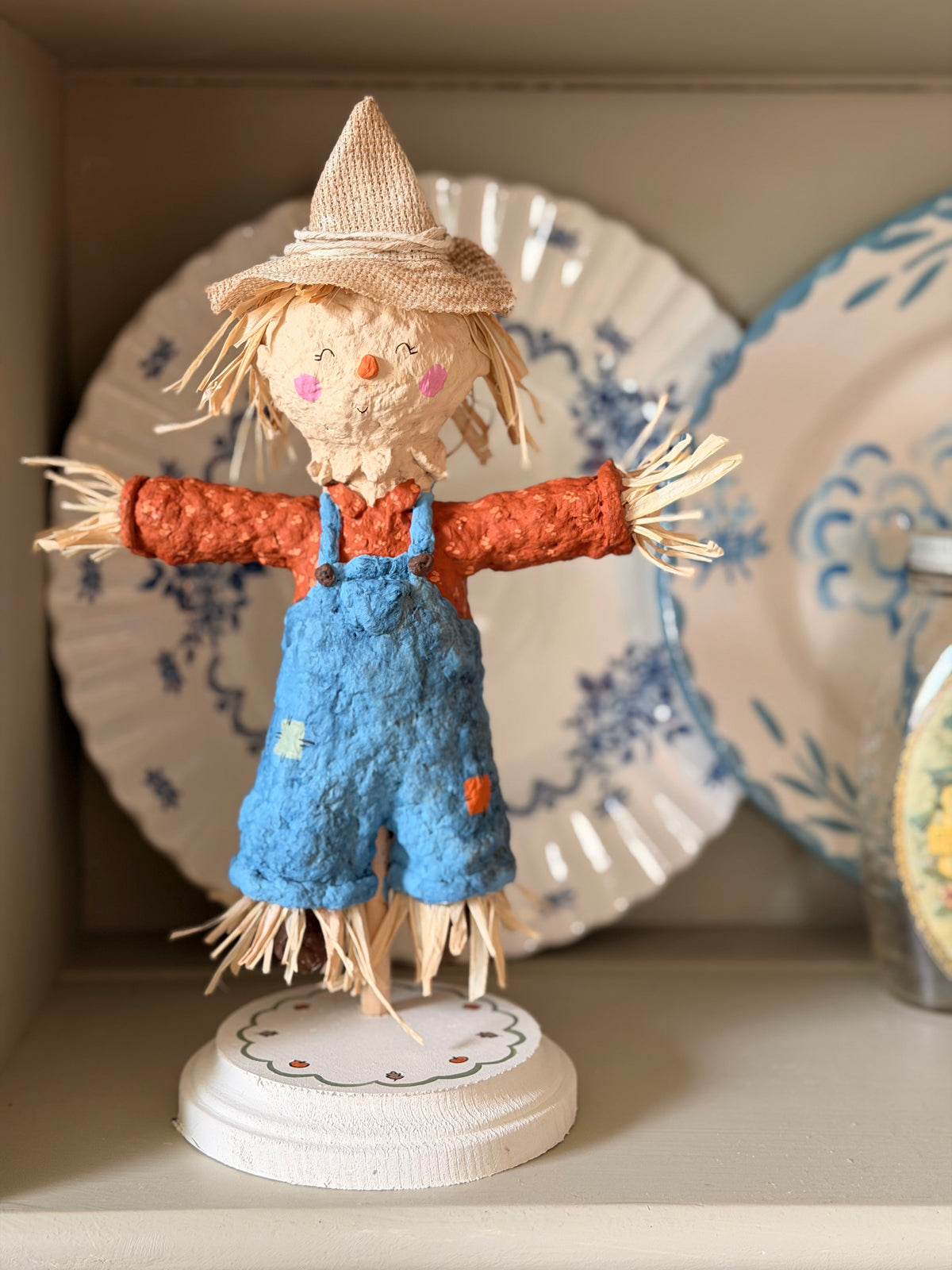 scarecrow boy paper mache figurine