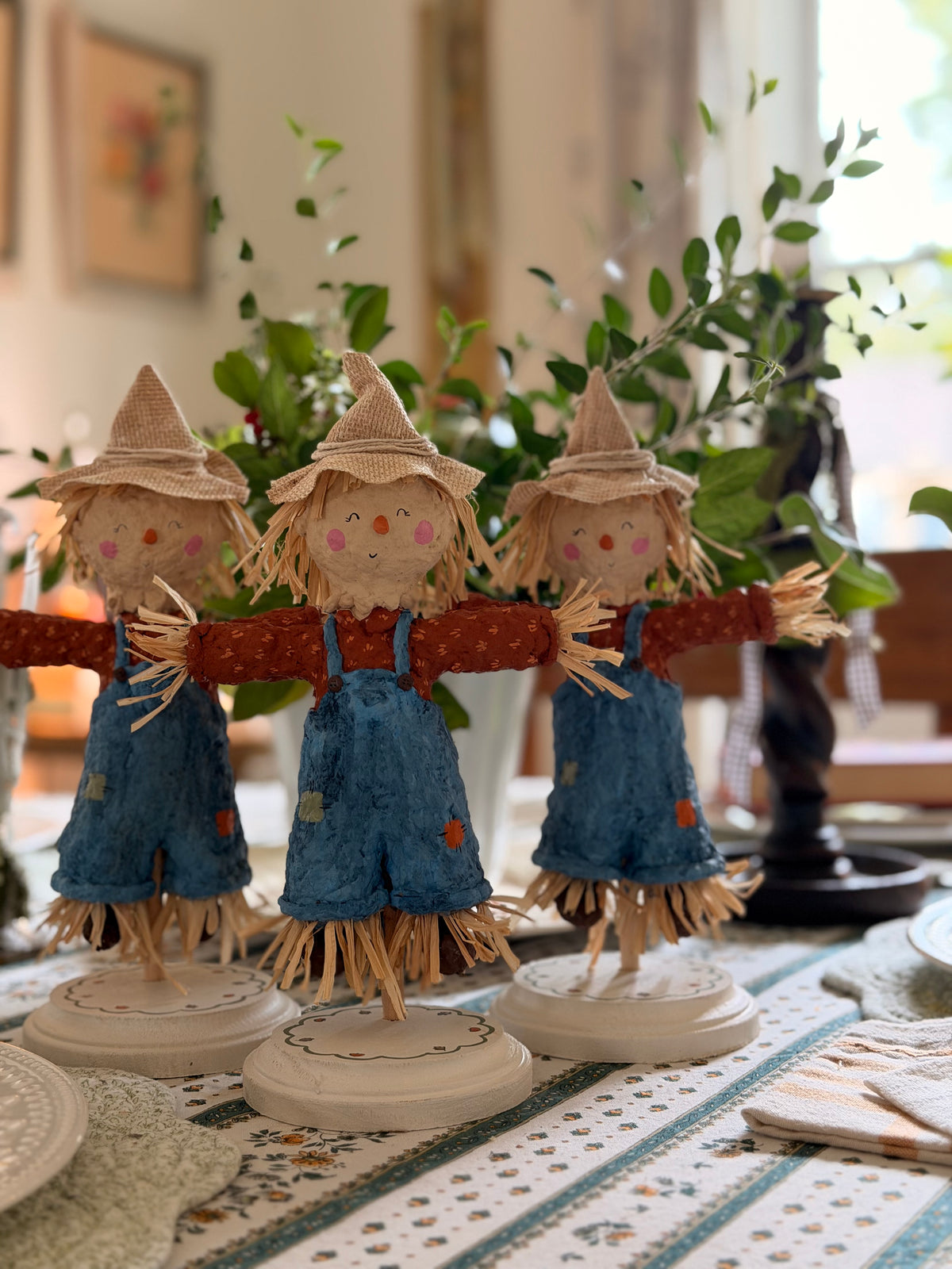 scarecrow boy paper mache figurine