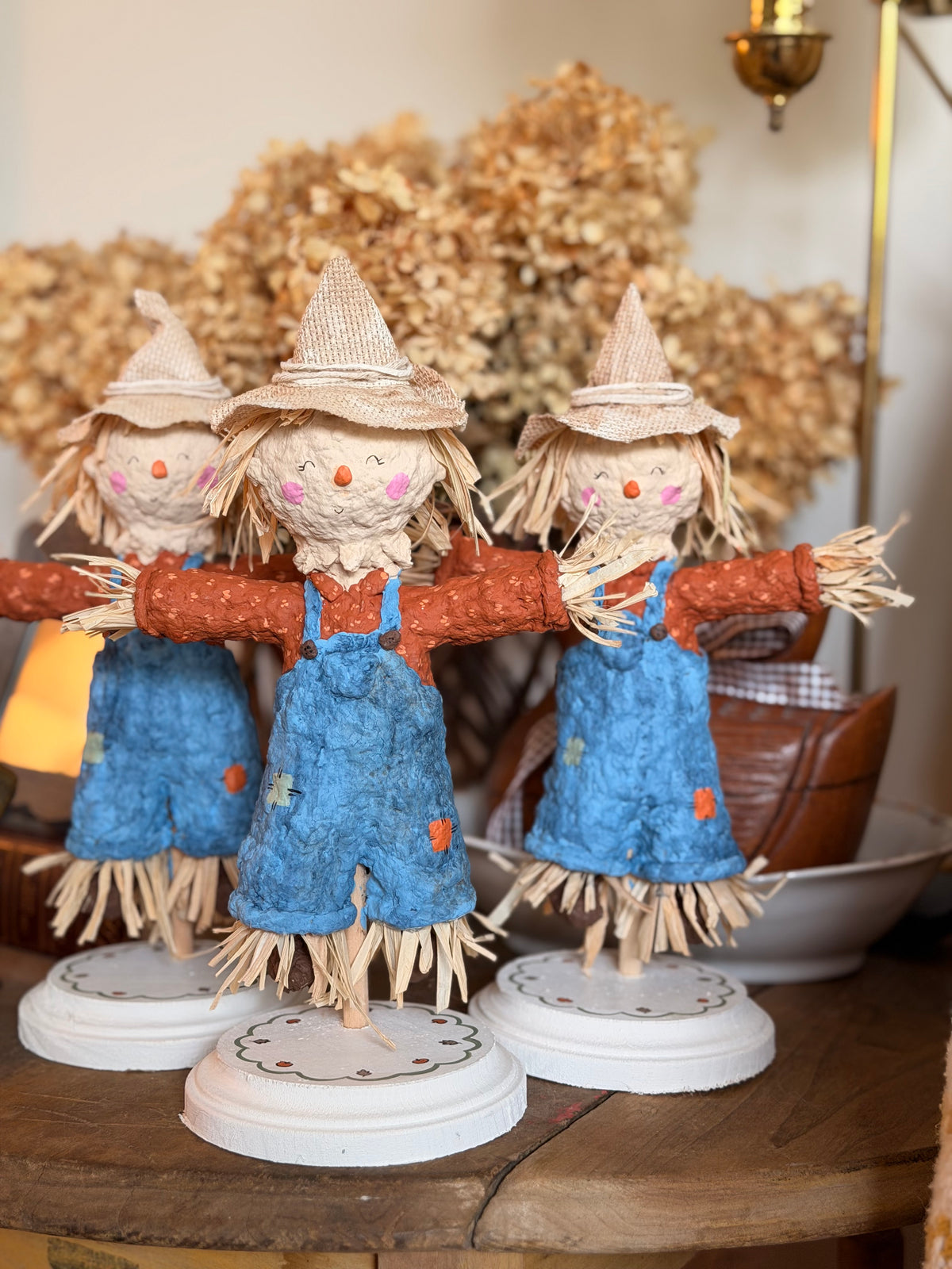 scarecrow boy paper mache figurine