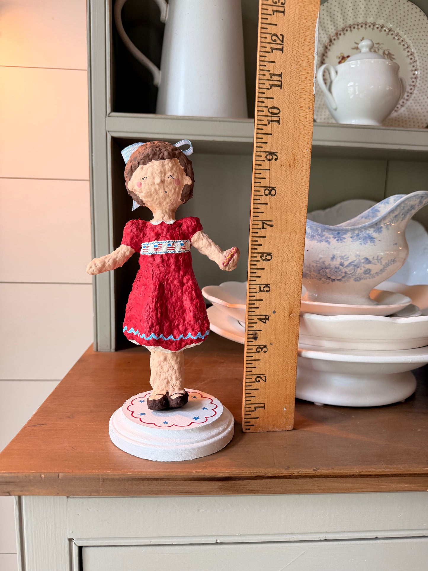 Maisie the Patriotic Girl paper mache figurine